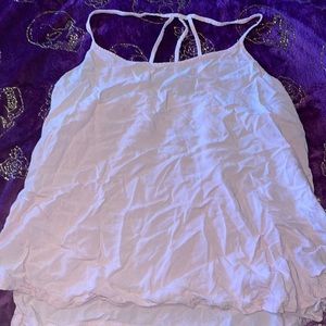 Light pink flow top with side slits